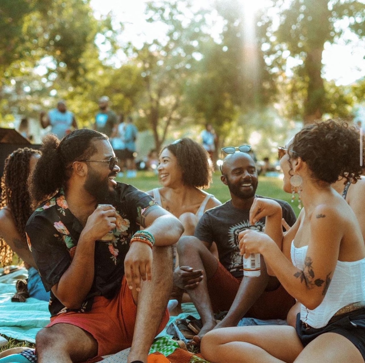 People enjoying an event in the park in summer